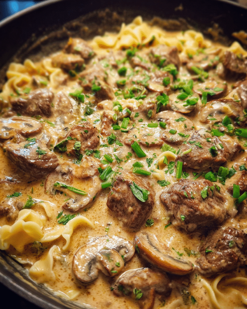 Beef Stroganoff Recipe served over egg noodles with creamy mushroom sauce