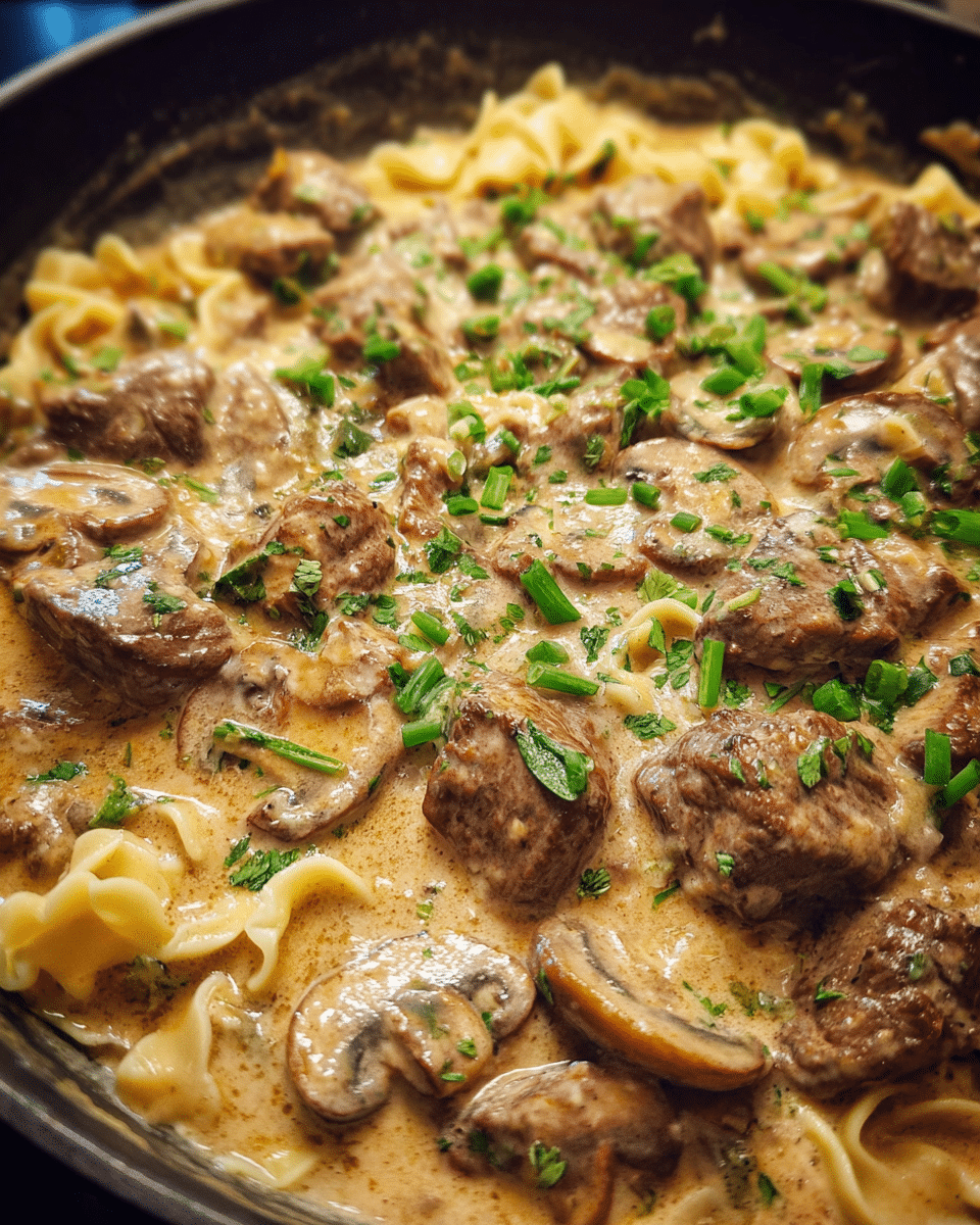 Beef Stroganoff Recipe served over egg noodles with creamy mushroom sauce