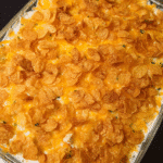 Cheesy chicken hashbrown casserole with golden cornflake topping