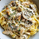 creamy chicken mushroom fettuccine alfredo in bowl