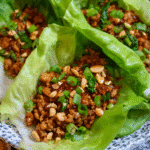 Sweet and Spicy Chicken Lettuce Wraps with fresh toppings