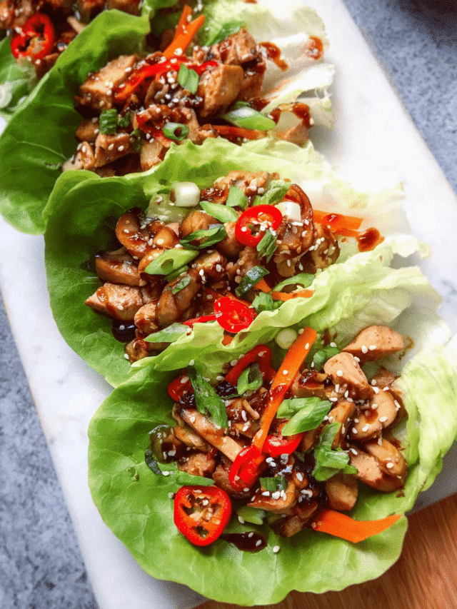 Asian chicken lettuce wraps served with vegetables