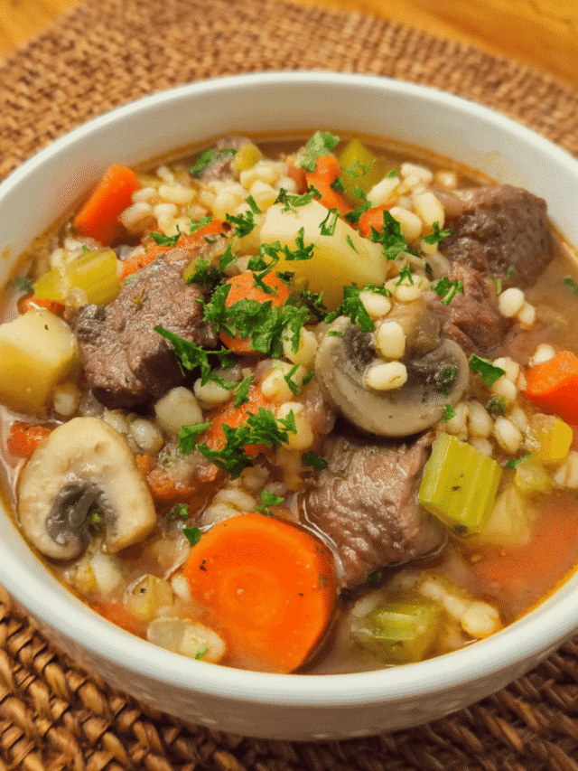 Beef, barley, and mushroom herb stew in a bowl