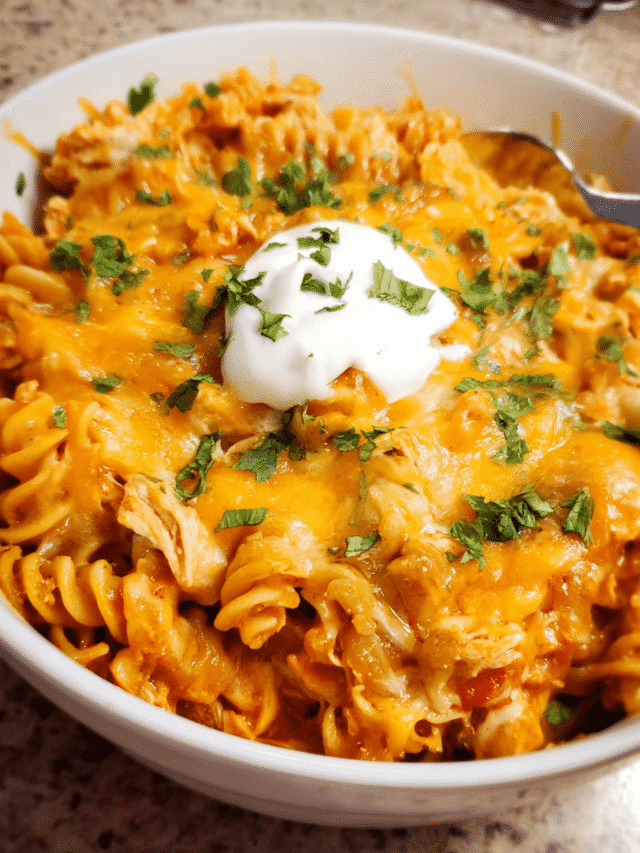 cheesy chicken enchilada pasta baked with melted cheese