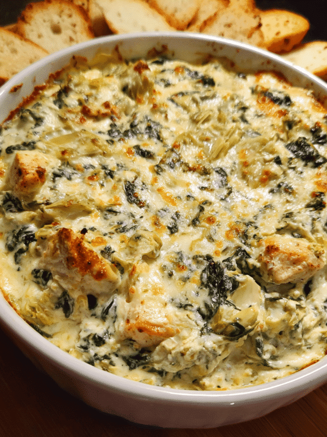 Chicken Spinach Artichoke Dip in a hot, creamy baked appetizer dish