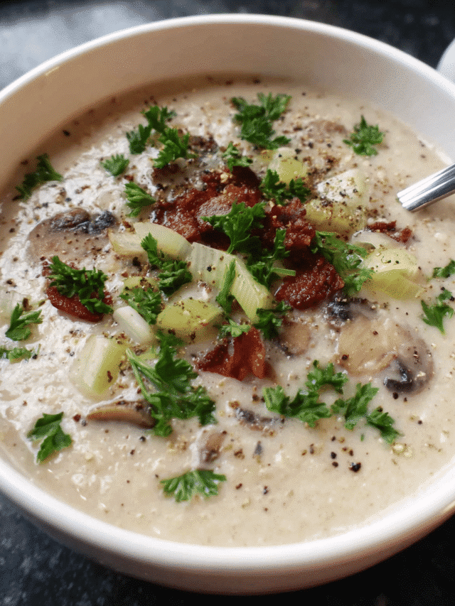 Bowl of creamy mushroom and leek soup with parsley