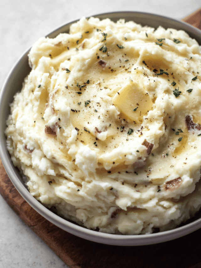 Creamy garlic mashed potatoes in a serving bowl