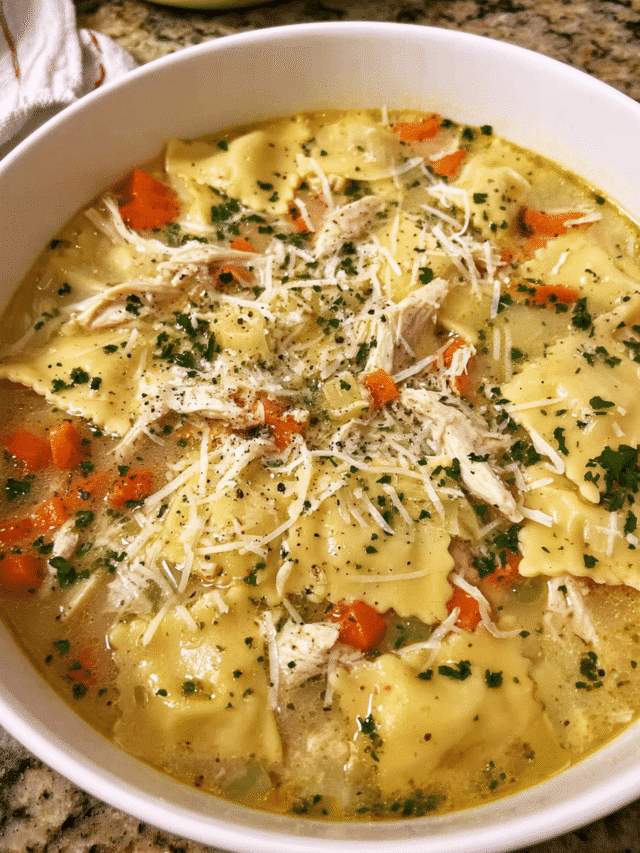 Italian chicken ravioli soup served hot in a bowl
