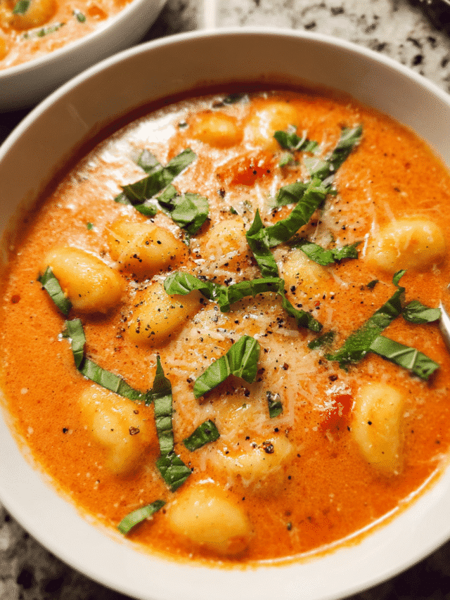 Creamy tomato basil gnocchi soup in a bowl