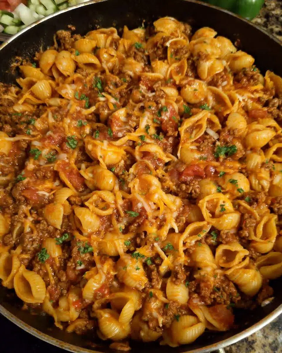 Beef taco pasta skillet with melted cheese