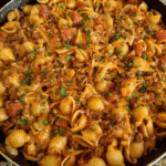 Beef taco pasta skillet with melted cheese