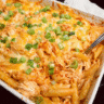 Cheesy Buffalo Chicken Pasta Bake fresh out of the oven with golden, bubbly cheese