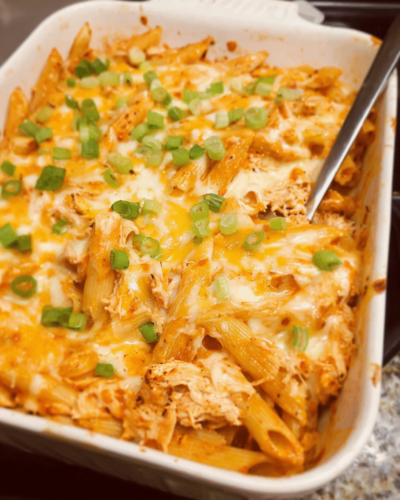 Cheesy Buffalo Chicken Pasta Bake fresh out of the oven with golden, bubbly cheese
