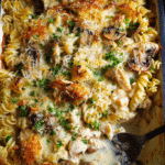 Creamy chicken alfredo pasta bake with melted cheese