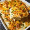 Creamy Chicken Ranch Lasagna layered with cheese and herbs in a casserole dish