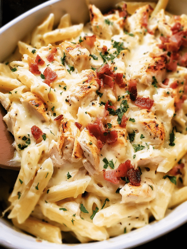 Chicken Ranch Pasta Bake in a casserole dish topped with melted cheese