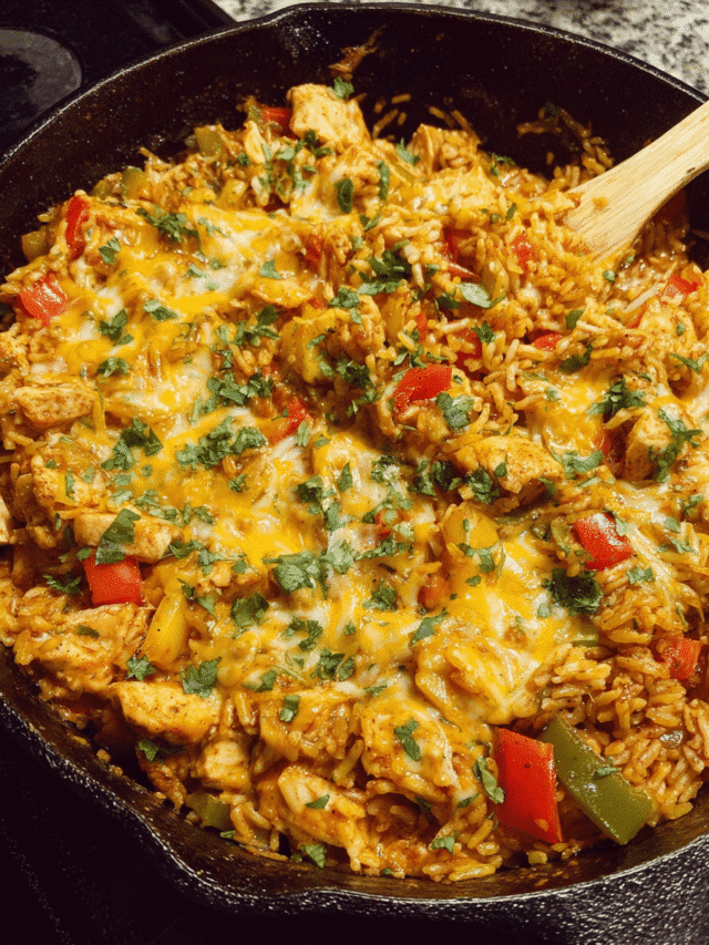 Chicken fajita rice skillet in one pan topped with melted cheese