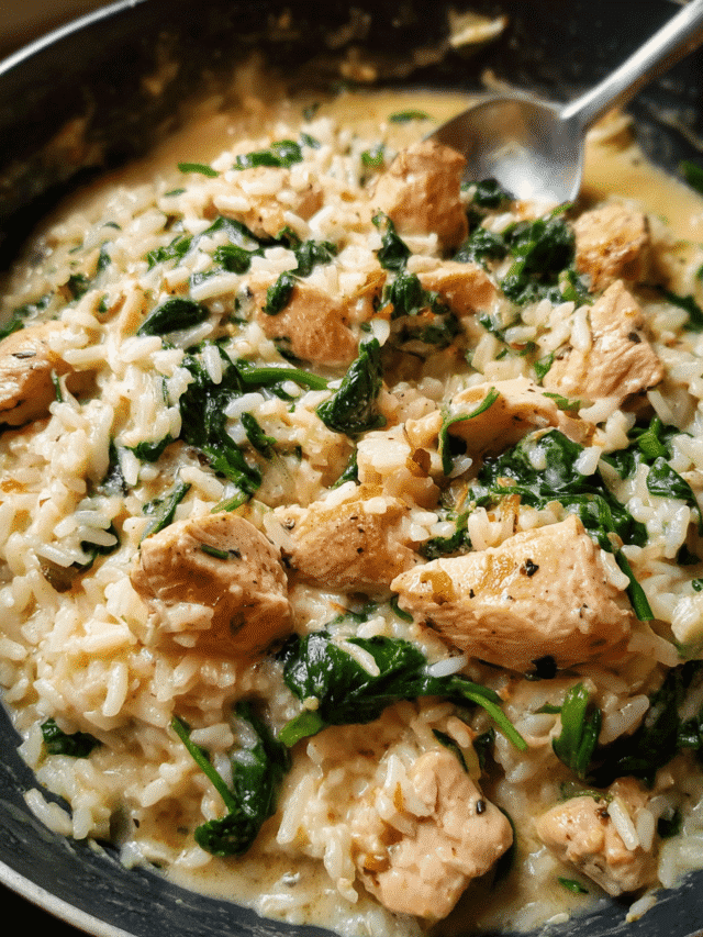Creamy garlic chicken rice skillet in a cast iron pan
