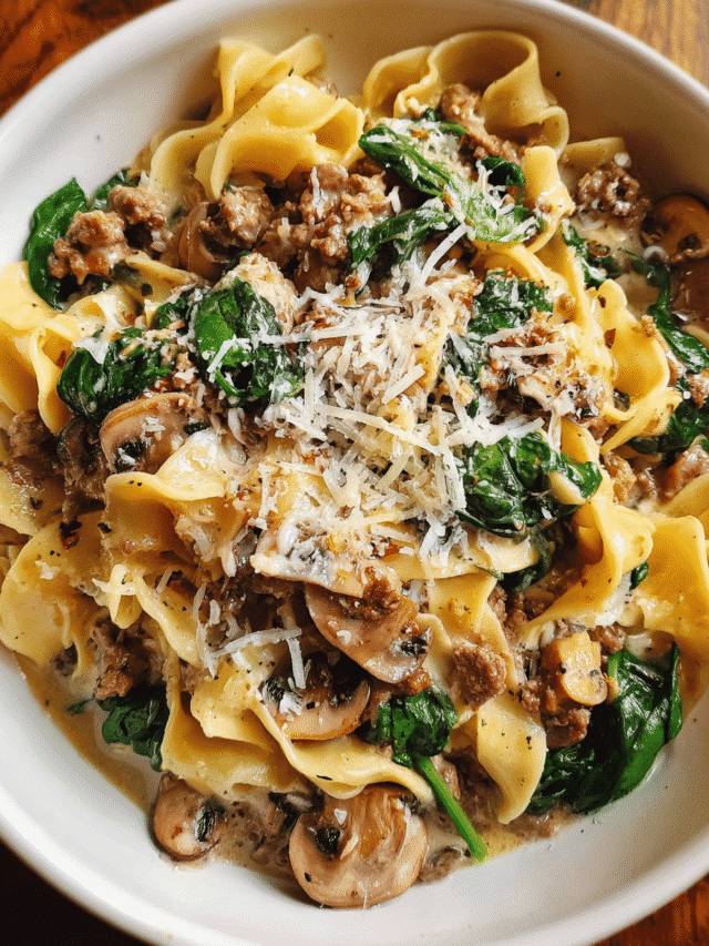 One Pot Cheesy Mushroom Spinach Beef Pasta in a skillet