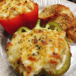 Creamy Alfredo Chicken Stuffed Peppers baked with melted mozzarella