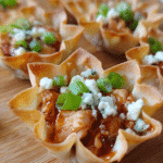 BBQ Chicken Wonton Cups baked golden in a mini muffin pan