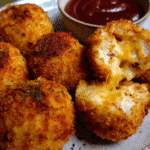 Cheesy Chicken Stuffed Potato Balls with melted cheddar center