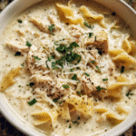 Bowl of Chicken Alfredo Chowder with fresh herbs