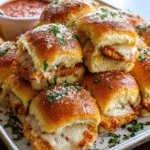 Baked Chicken Parmesan Sliders with melted mozzarella and marinara