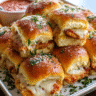 Baked Chicken Parmesan Sliders with melted mozzarella and marinara