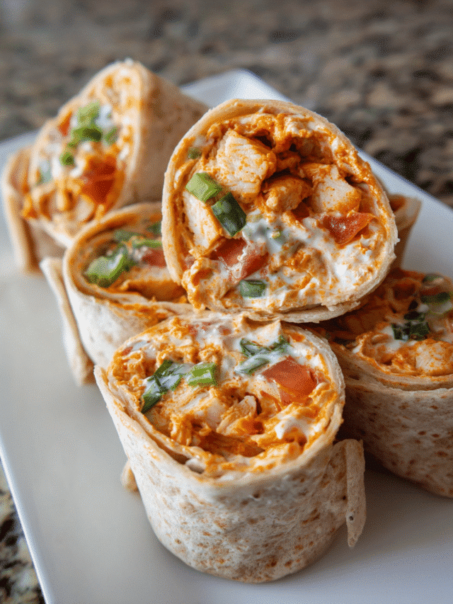 Buffalo Chicken Ranch Roll-ups sliced into pinwheels on a serving platter