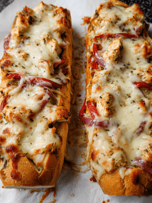 Cheesy chicken garlic bread baked with melted mozzarella and peppers