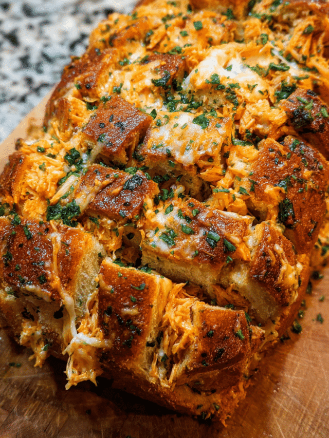 Cheesy Chicken Ranch Pull Apart Bread fresh out of the oven, golden and bubbling with melted cheese.