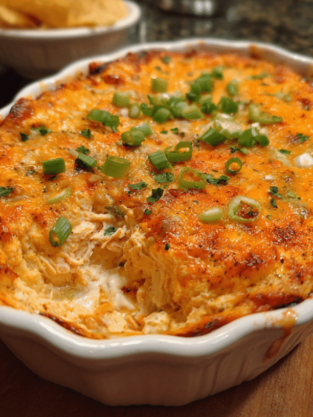 Cheesy Chicken Taco Dip baked until golden and bubbly