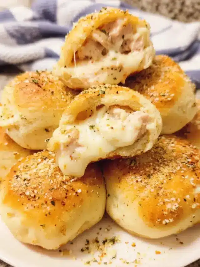 Golden Chicken Alfredo Cheese Bombs brushed with garlic butter and Parmesan