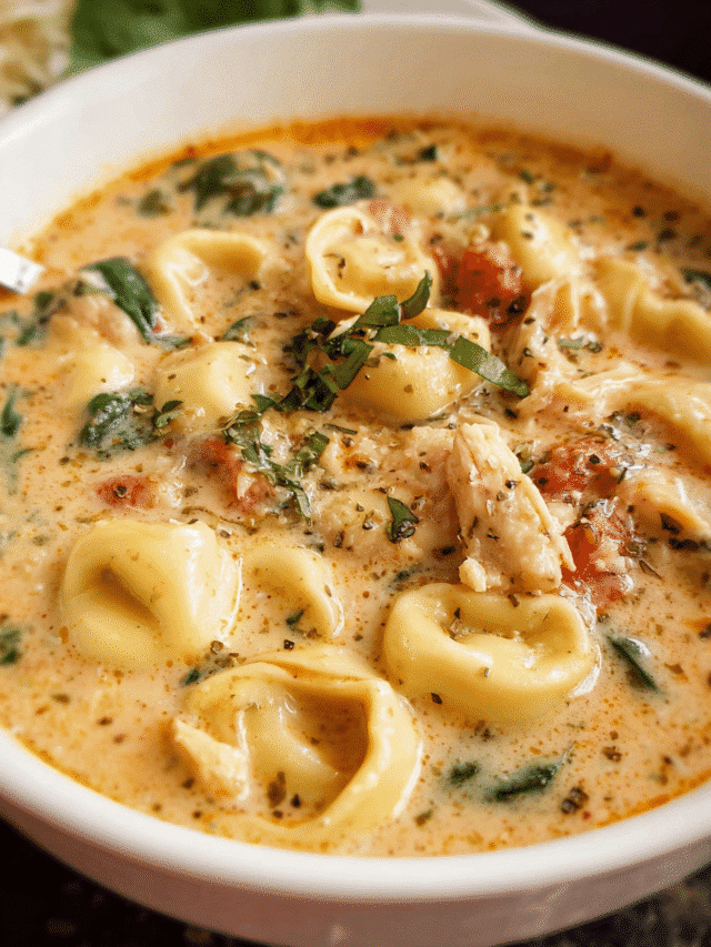 Bowl of Chicken Parmesan Tortellini Soup with spinach and cheese