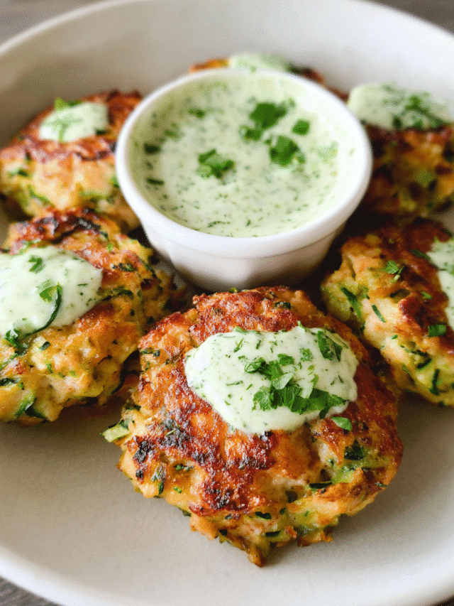 Golden chicken zucchini poppers served with creamy cilantro sauce