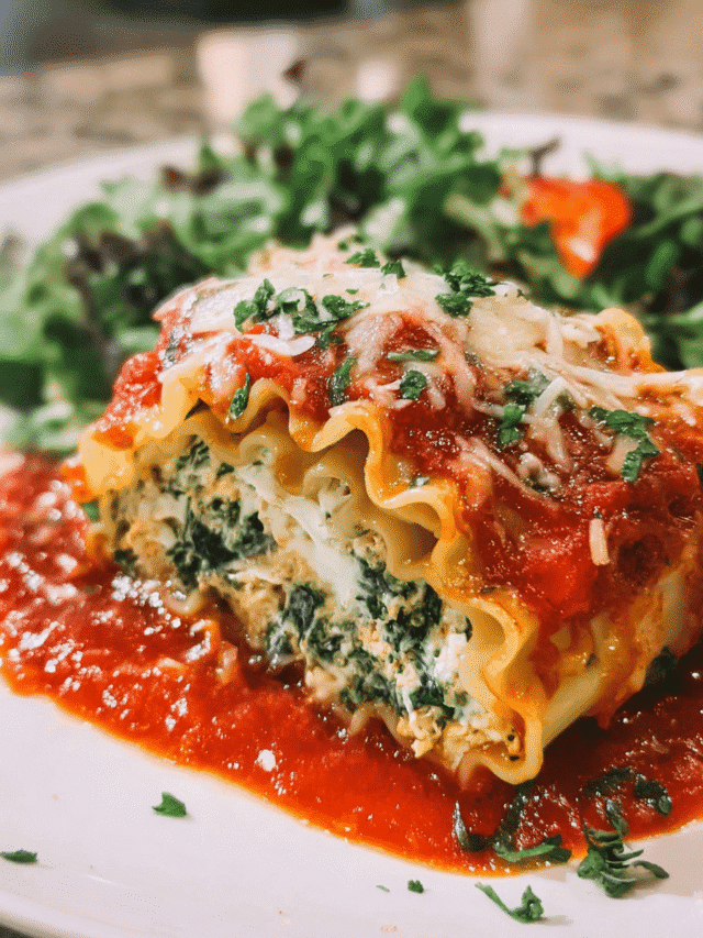 Creamy Spinach Chicken Lasagna Roll Ups baked with marinara and mozzarella