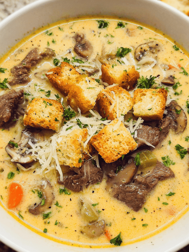 Philly Cheesesteak Soup in a bowl with croutons