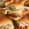Chicken Parmesan Slider Squares baked with melted cheese and marinara on Hawaiian rolls