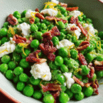 Summer pea salad with goat cheese, pecans, and lemon dressing