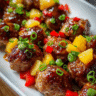 Teriyaki meatballs with pineapple and green onions