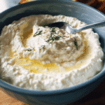 Creamy whipped feta spread served with pita bread and vegetables