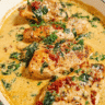 Creamy baked chicken breasts with spinach and sun-dried tomatoes