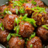 Orange marmalade glazed meatballs in a serving dish