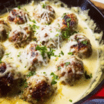 baked creamy meatball casserole with melted cheese