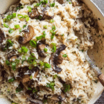 creamy garlic mushroom rice served with green onions