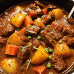 slow cooker beef stew hearty with carrots and potatoes