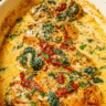 Creamy baked chicken breasts with spinach and sun-dried tomatoes