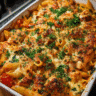 baked creamy chicken pasta fresh from oven with melted cheese
