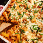 Cheesy baked Italian sausage pasta with marinara and basil